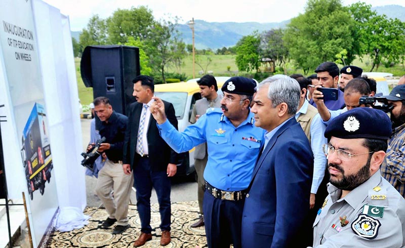 Interior Minister Mohsin Naqvi inaugurating Islamabad Traffic Police Facilitation on Wheels & Islamabad Traffic Police Education on Wheels