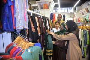 Women shopping clothes for Eid at Resham bazaar