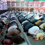 A Large number of people offering Jumma-Tul-Wida prayer during the Holy month of Ramazan Ul Mubarak at Jamia Masjid Zia ul Aloom Satellite Town