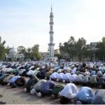A large number of faithful offering Eidul Fitr prayer at Eidgah Sharif