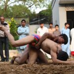 Pakistani wrestlers showcase their skills at the century-old Akhara during the annual spring wrestling competition at Liaqat Bagh