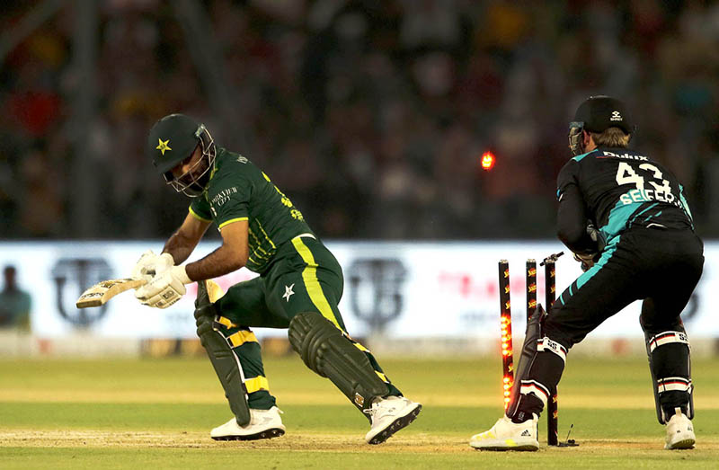 New Zealand Wicker keeper Trim Seifert try to stump the Pakistani batter Fakhar Zaman (not out) during the Fifth Twenty20 International cricket match between Pakistan and New Zealand at the Qaddafi cricket stadium