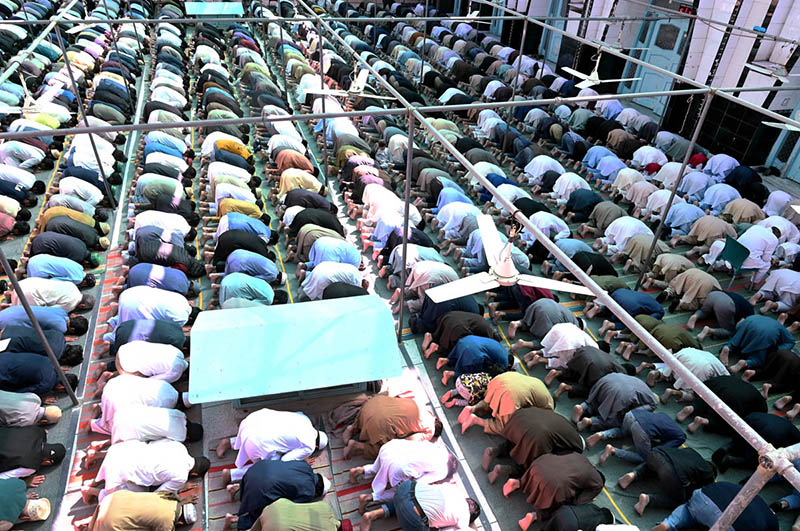 A Large number of people offering Jumma-Tul-Wida prayer during the Holy month of Ramazan Ul Mubarak at Jamia Masjid Zia ul Aloom Satellite Town