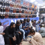 Women shopping clothes for Eid at Resham bazaar