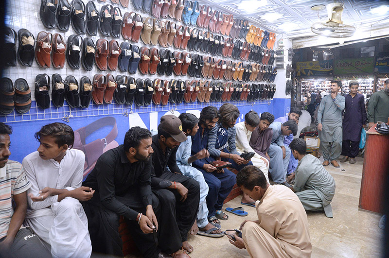 Women shopping clothes for Eid at Resham bazaar