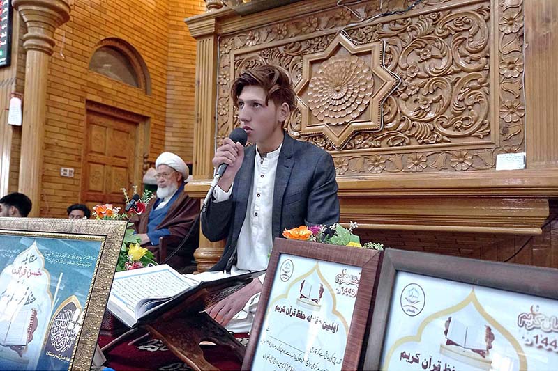 A participant reciting Holy Quran during the Husn-e-Qiraat and Hafiz Quran competition at Jamia Masjid Skardu-Baltistan in the Holy Month of Ramazan