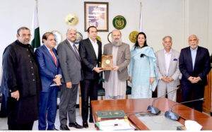 A delegation led by Atif Ikram Sheikh, President of the FPCCI meeting with Federal Minister for Commerce Jam Kamal to address economic challenges through close collaboration.