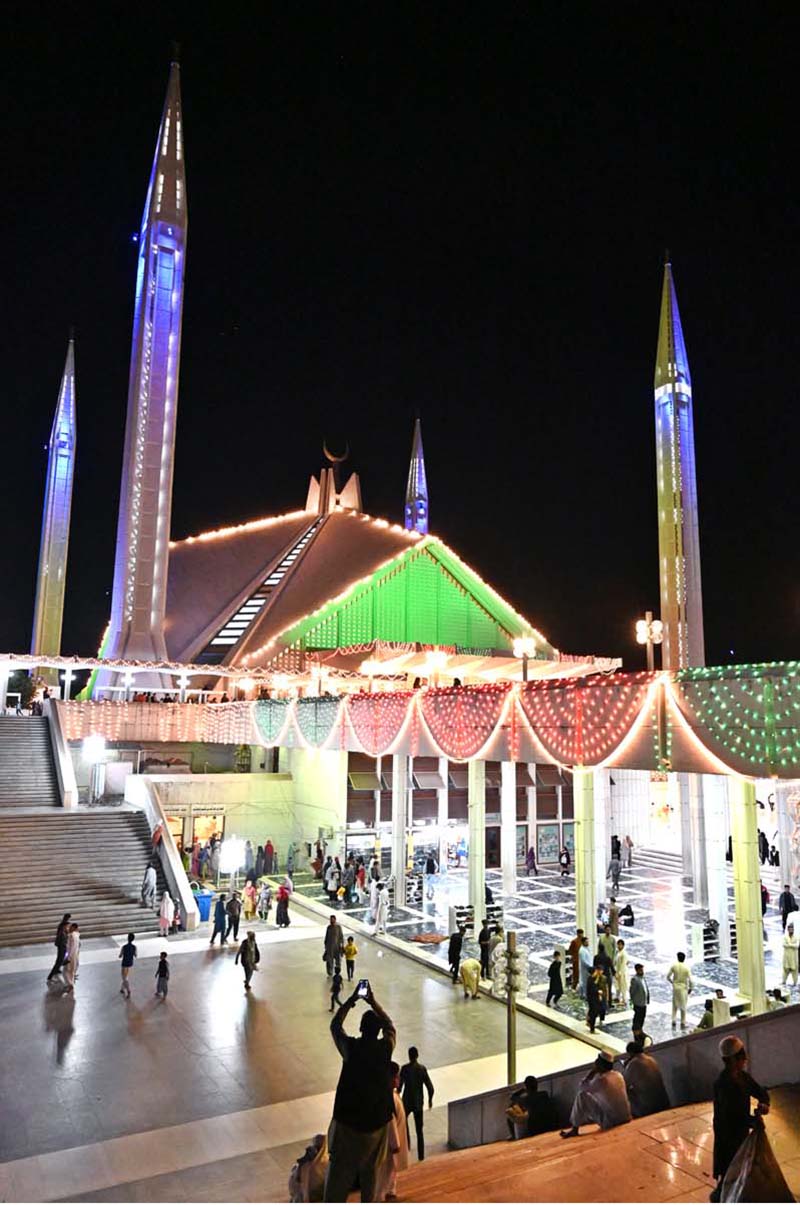 An illuminated view of Faisal Masjid decorated with colourful lights in connection with Shab-e-Qadar on 27th day of Holy fasting month of Ramzanul Mubarak