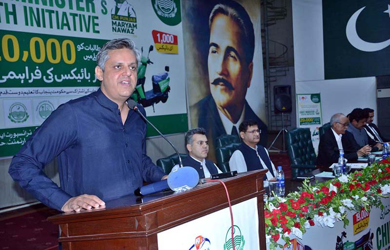 Provincial Minister for Transport and Mass Transit Bilal Akbar Khan addressing a seminar after inaugurating Urban Transport Plan & Road Show for Electric and Petrol Bikes Scheme at the Iqbal Auditorium University of Agricultural