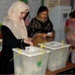 Female voters casting their votes in a polling station during the by-election 2024 at Garhi Shahu School