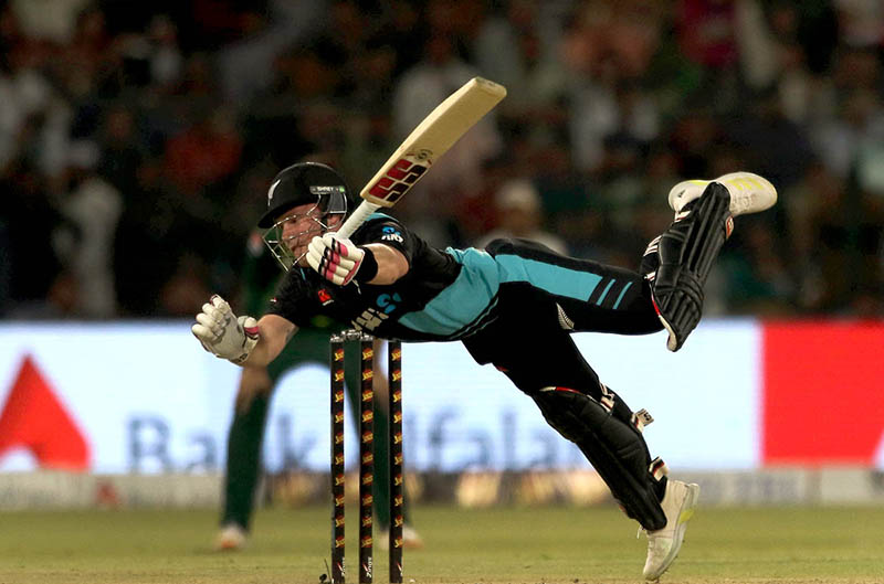 New Zealand batter Tim Seifert plays a shot during the Fifth Twenty20 International cricket match between Pakistan and New Zealand at the Qaddafi cricket stadium