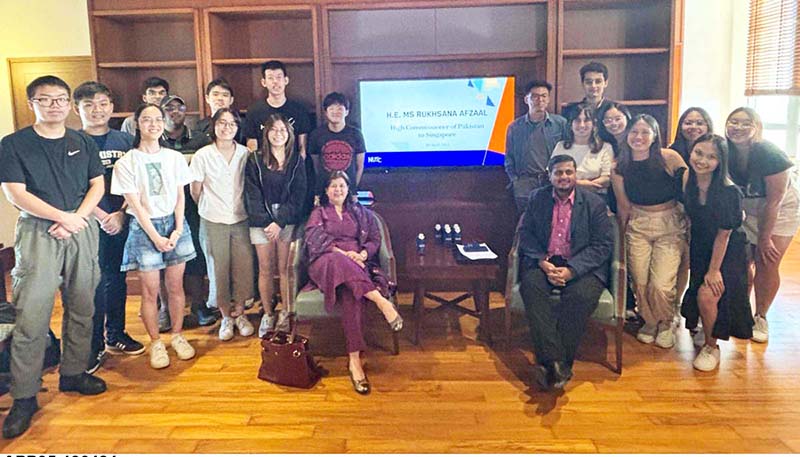 Pakistan's High Commissioner to Singapore, Ms. Rukhsana Afzaal in a group photo with students from the National University of Singapore (NUS), where she delivered a lecture on Pak-Singapore relations