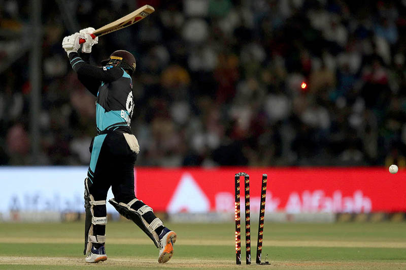 New Zealand batter Tim Seifert plays a shot during the Fifth Twenty20 International cricket match between Pakistan and New Zealand at the Qaddafi cricket stadium