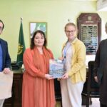 Coordinator to PM on climate change Romina Khurshid Alam being presented a book on safeguarding Indus river vitality by Indus river team