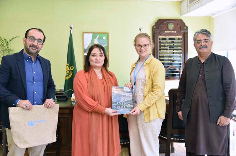 Coordinator to PM on climate change Romina Khurshid Alam being presented a book on safeguarding Indus river vitality by Indus river team
