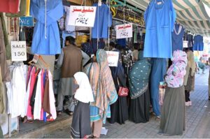 Families purchasing school uniform for their children as new session starts in schools at H-9 Weekly Bazaar in Federal Capital.