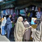 Families purchasing school uniform for their children as new session starts in schools at H-9 Weekly Bazaar in Federal Capital.