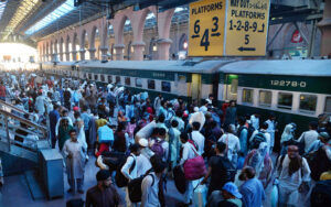 People boarding on train at Railway Station to leave for their hometowns to celebrate Eid-ul-Fitr with their loved ones