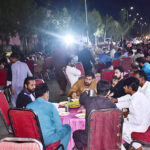 Volunteers of a social organization Umm al-Qura Haji Pura distributing food during Sehri in Ramadan al Mubarak