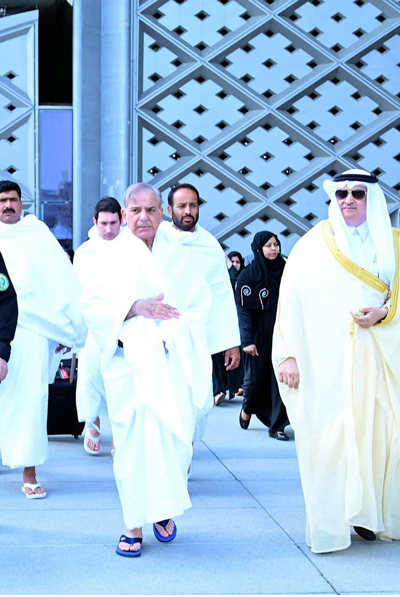 Prime Minister Muhammad Shehbaz Sharif is being received by Ambassador of Saudi Arabia to Pakistan, Nawaf Al Saeed Al Maliki