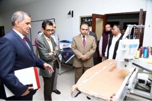 Federal Minister for Science and Technology Khalid Maqbool Siddiqui being briefed about departments at NUTECH University.