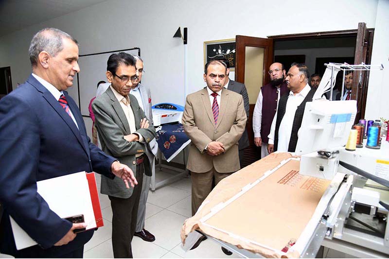 Federal Minister for Science and Technology Khalid Maqbool Siddiqui being briefed about departments at NUTECH University.