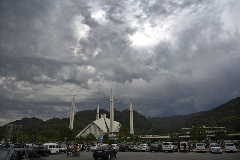 Thick Clouds hovering over the sky at Faisal Mosque in the Federal Capital.
