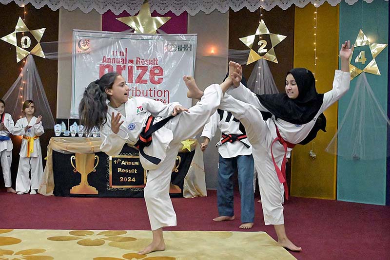 Students showing their skills in Taekwondo during Annual Prize Distribution Ceremony of Khabib Girls School and College.