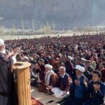 A large number of faithful offering dua after Eid-ul-Fitr prayer at Eidgah Ground