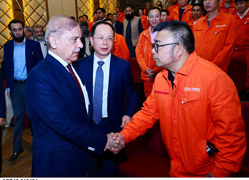 Prime Minister Muhammad Shehbaz Sharif interacts with engineers of the China Gezhouba Group Company (CGGC) working at the Daasu Hydropower project.