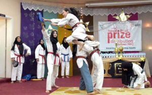 Students showing their skills in Taekwondo during Annual Prize Distribution Ceremony of Khabib Girls School and College.