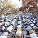 A large number of faithful offering Eid-ul-Fitr prayer at Eidgah Ground