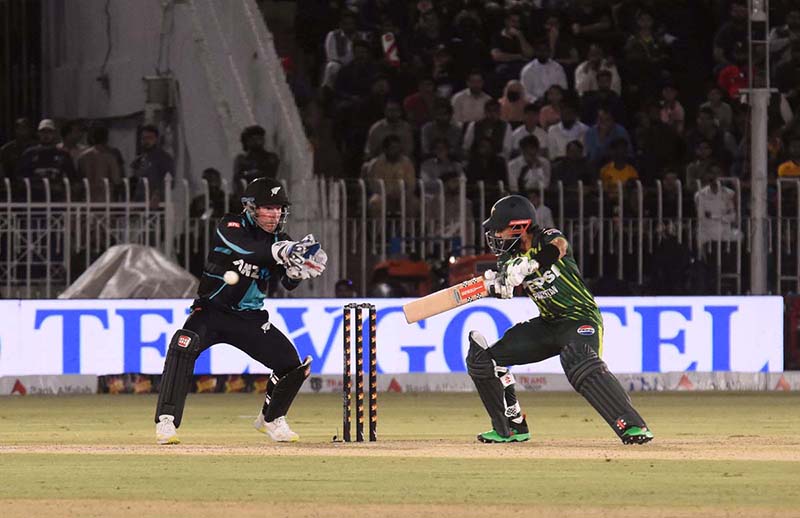 Pakistan’s batter Usman khan play a shot during the 3rd T20 cricket match between Pakistan vs New Zealand at Pindi Cricket Stadium