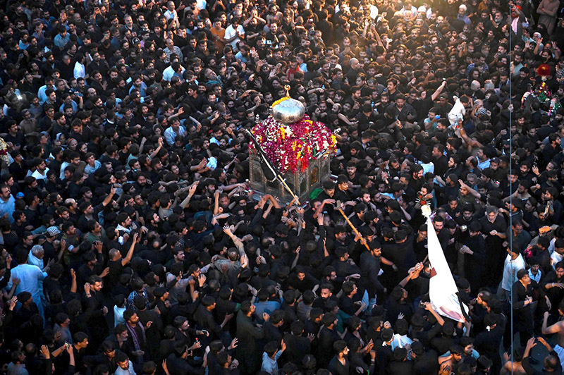 Shiite Muslim mourners take part in a procession to commemorate the death anniversary of Prophet Mohammad's (PBUH) companion and son-in-law Imam Ali (AS) during the Islamic month of Ramadan.