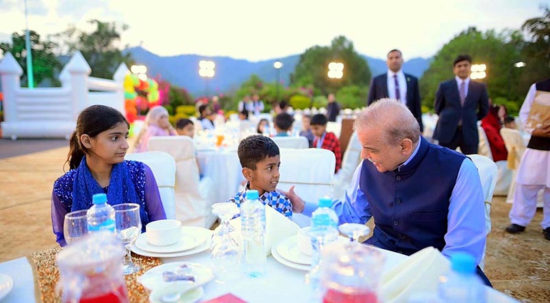 Prime Minister Muhammad Shehbaz Sharif meets orphans and differently abled children at an Iftar organized for them