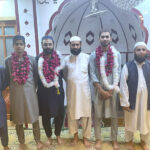 Devotees pose for group photo after Itikaf in a mosque as the Central Ruet-i-Hilal Committee Chairman Maulana Abdul Khabir Azad announces the sighting of Shawwal moon