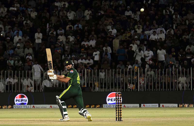 Pakistan’s batter Usman khan play a shot during the 3rd T20 cricket match between Pakistan vs New Zealand at Pindi Cricket Stadium