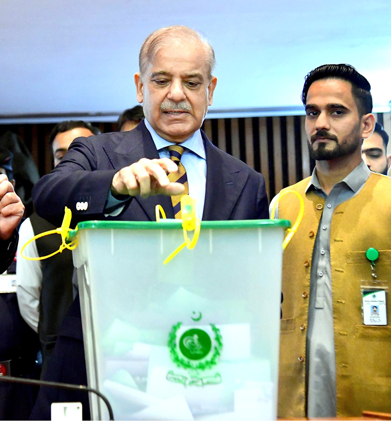 Prime Minister Muhammad Shehbaz Sharif casting his vote at the Senate elections at Parliament House.