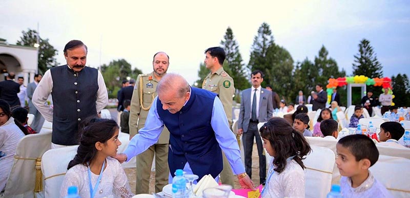 Prime Minister Muhammad Shehbaz Sharif meets orphans and differently abled children at an Iftar organized for them