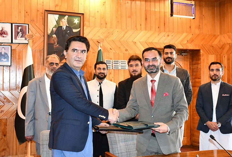 Additional Chief Secretary Gilgit-Baltistan Cap (R) Mushtaq and Director SPARKO signing MoUs for giving GIS to the effecties of Diamer Basha Dam