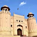 A view of Alamgiri Gate of Lahore Fort. The Alamgiri Gate, constructed by Emperor Aurangzeb in 1674, serves as the primary entrance to the Lahore Fort, situated on the western side of the Fort complex, facing the historical Shahi Qila. The history of Shahi Qila goes back to 1550s at the time of emperor Akbar (1556-1605) to Aurangzeb (1658-1707). It is located in the North-West of the city that is spread 427 meters east-west and 335 meters north-south. The south-east area occupied Akbar’s court. The northern area is distributed into six compartments starting from Akbari Gate to Shish Mahal. In 1981 UNESCO enlisted Lahore Fort as World Heritage Site
