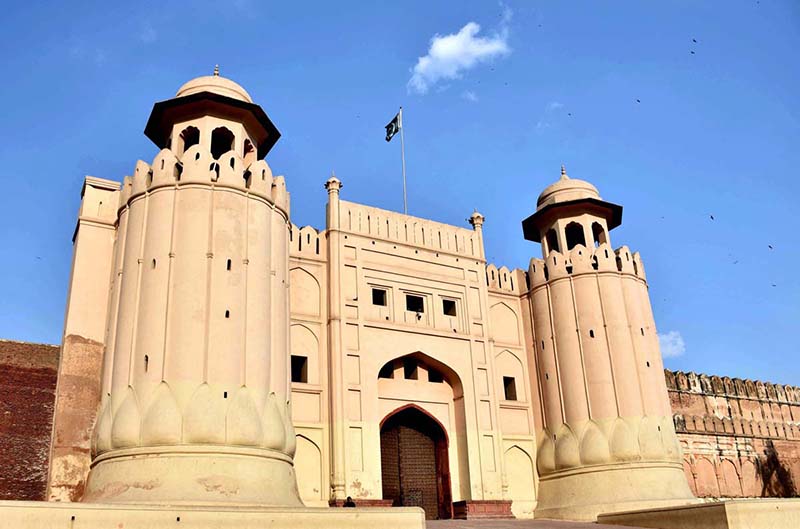 A view of Alamgiri Gate of Lahore Fort. The Alamgiri Gate, constructed by Emperor Aurangzeb in 1674, serves as the primary entrance to the Lahore Fort, situated on the western side of the Fort complex, facing the historical Shahi Qila. The history of Shahi Qila goes back to 1550s at the time of emperor Akbar (1556-1605) to Aurangzeb (1658-1707). It is located in the North-West of the city that is spread 427 meters east-west and 335 meters north-south. The south-east area occupied Akbar’s court. The northern area is distributed into six compartments starting from Akbari Gate to Shish Mahal. In 1981 UNESCO enlisted Lahore Fort as World Heritage Site