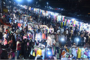 In connection with preparations for Eid-ul-Fitr, women are selecting to buy bangles from the stalls set up in Bachat Bazar.