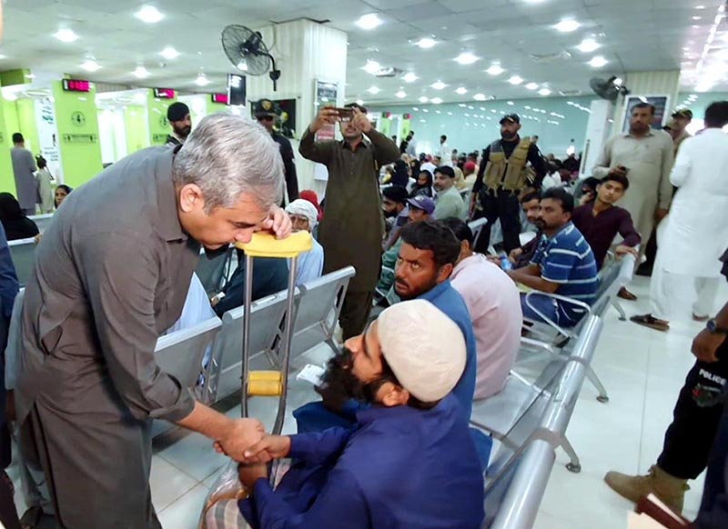 Federal Minister for Interior Mohsin Naqvi listening to the issues of special citizens during his visit to Sukkur on the occasion of inspection of NADRA Center.