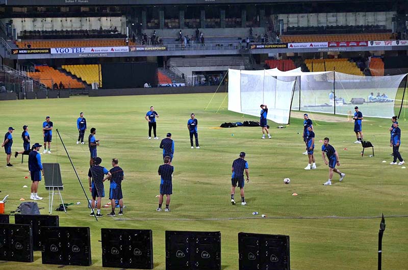 New Zealand Cricket Team players warm up during a practice session at the Qaddafi Cricket Stadium during the Five-Match T20 series.