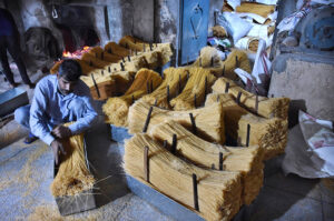 Worker busy in hanging the vermicelli for dry purpose at his workplace in connection with upcoming Eidul Fitr.