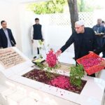 President Asif Ali Zardari showering flowers on graves of his parents and relatives in Shaheed Benazirabad