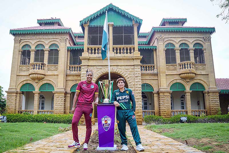 Pakistan Women’s Cricket Team ODIs Captain, Nida Dar and West Indies Cricket Team Captain Hayley Matthews pose with ODI Series Trophy during unveil at Quaid-e-Azam House.