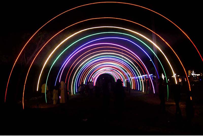 An eye catching view of lights at night on the green belt of Canal Mall.