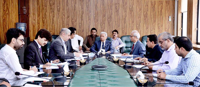 Federal Minister for Industries Production and Food Security, Rana Tanveer Hussain being briefed by Commissioner Livestock  Stock regarding Livestock Department.